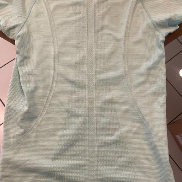 Lululemon sz 12 short sleeve shirt. Mint green - Picture 2 of 3